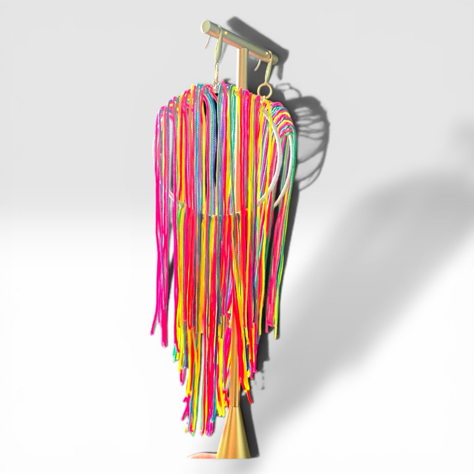 Electric Muse lightweight fringe earrings, white silk hoop with neon multicolor fringe, handmade by Dana Kelly